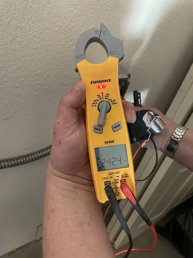Voltage testing with clamp meter during Hot Tub / Pool Electrical Wiring in Clark